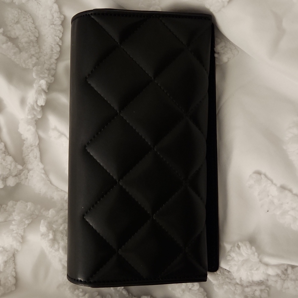 Black Chanel sunglasses empty case.